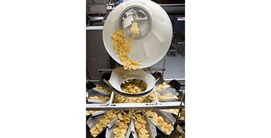 Sistema centralizado de alimentación y envasado de patatas fritas